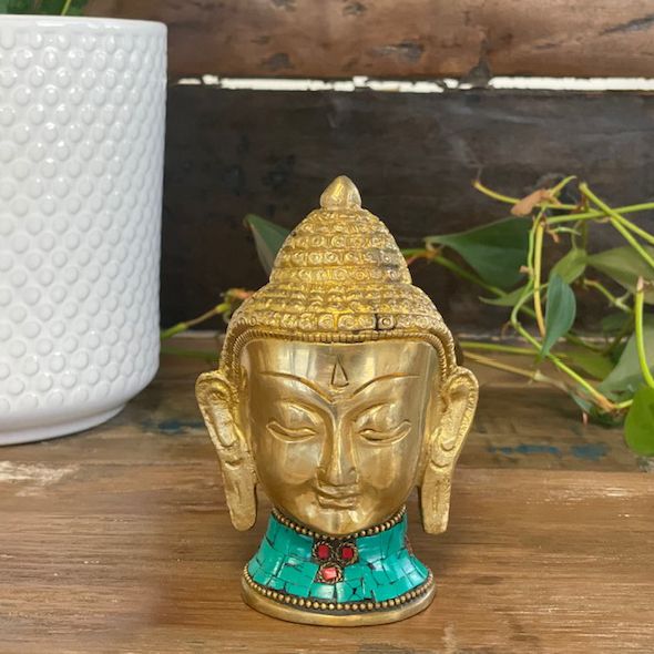 Alt Tag: Brass Buddha Figure – Large Head 11.5 CM brass Buddha head statue with turquoise howlite stone inlay on wooden surface