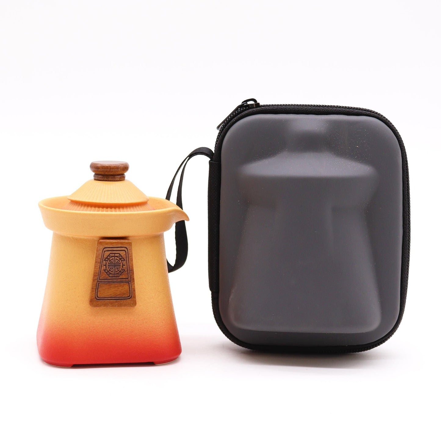 Ceramic Herbal Teapot Set – Orange Earth – 3 Cups, teapot with lid in orange gradient next to black zip travel case
