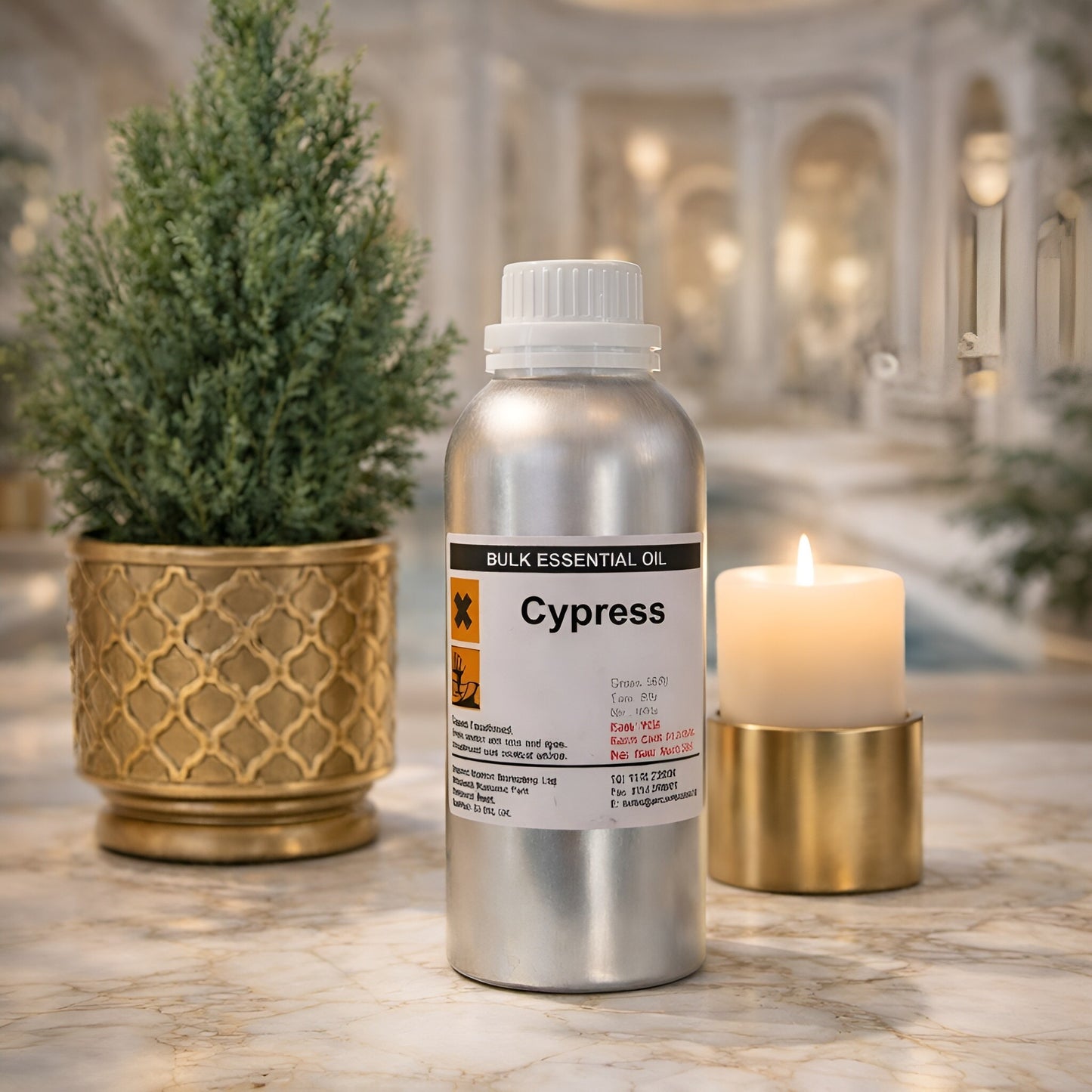 Alt Tag: Cypress Essential Oil – 0.5KG Bulk aluminum bottle on marble countertop with candle and potted plant in spa setting