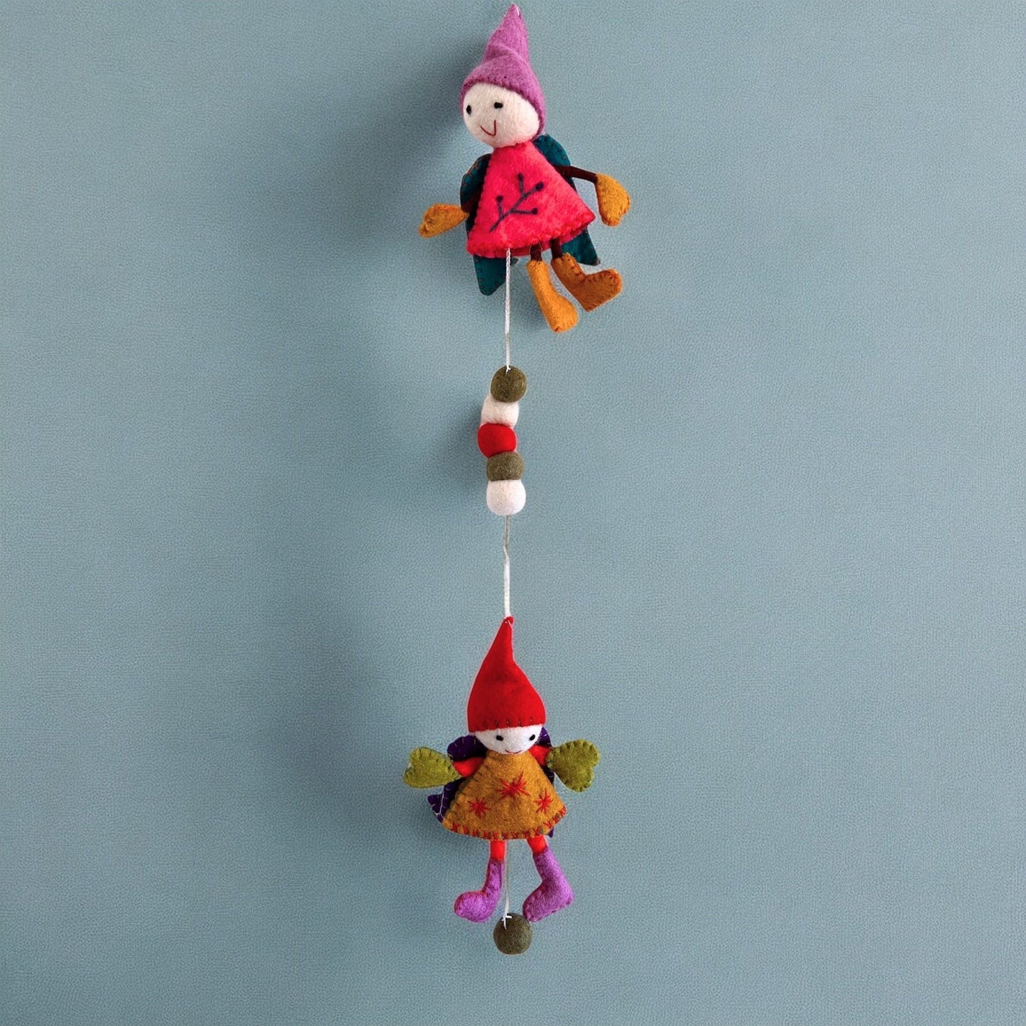 Alt Tag: Handmade Felt Fairy Angels – 110 CM Wall Hanging with pastel felt fairy angels hanging on string, handmade Nepal decor