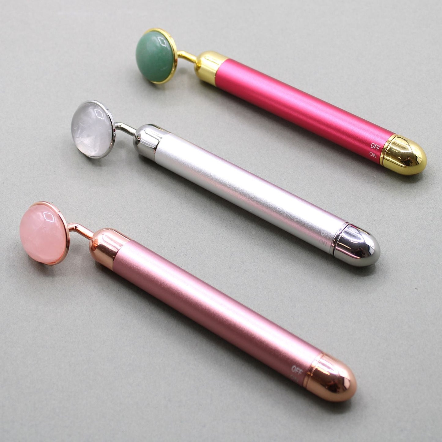 Alt Tag: Jade Gemstone Face Roller – 15.5 CM, rodillo facial de jade con mango metálico y cabezal de piedra verde