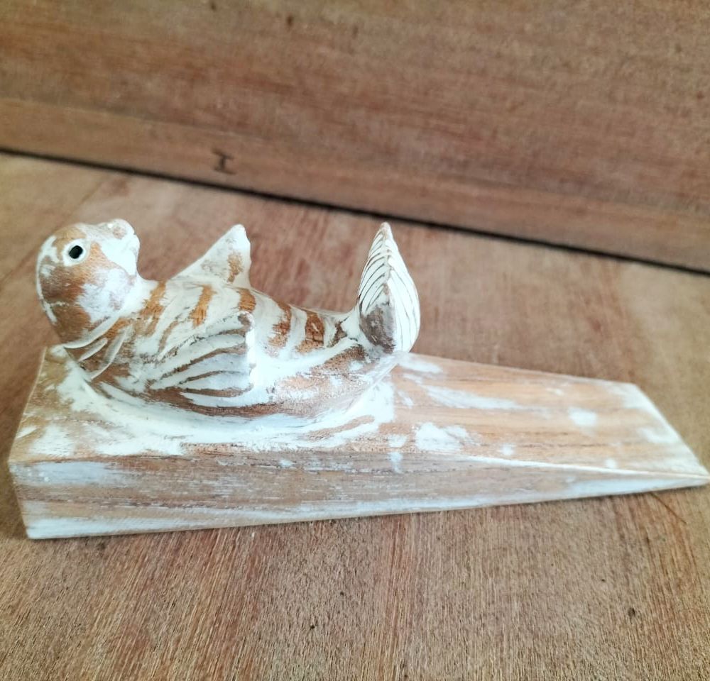 Alt Tag: Jempines Wood Doorstop – Baby Seal 16.5x4x6 CM hand-carved baby seal wooden door wedge on wood floor