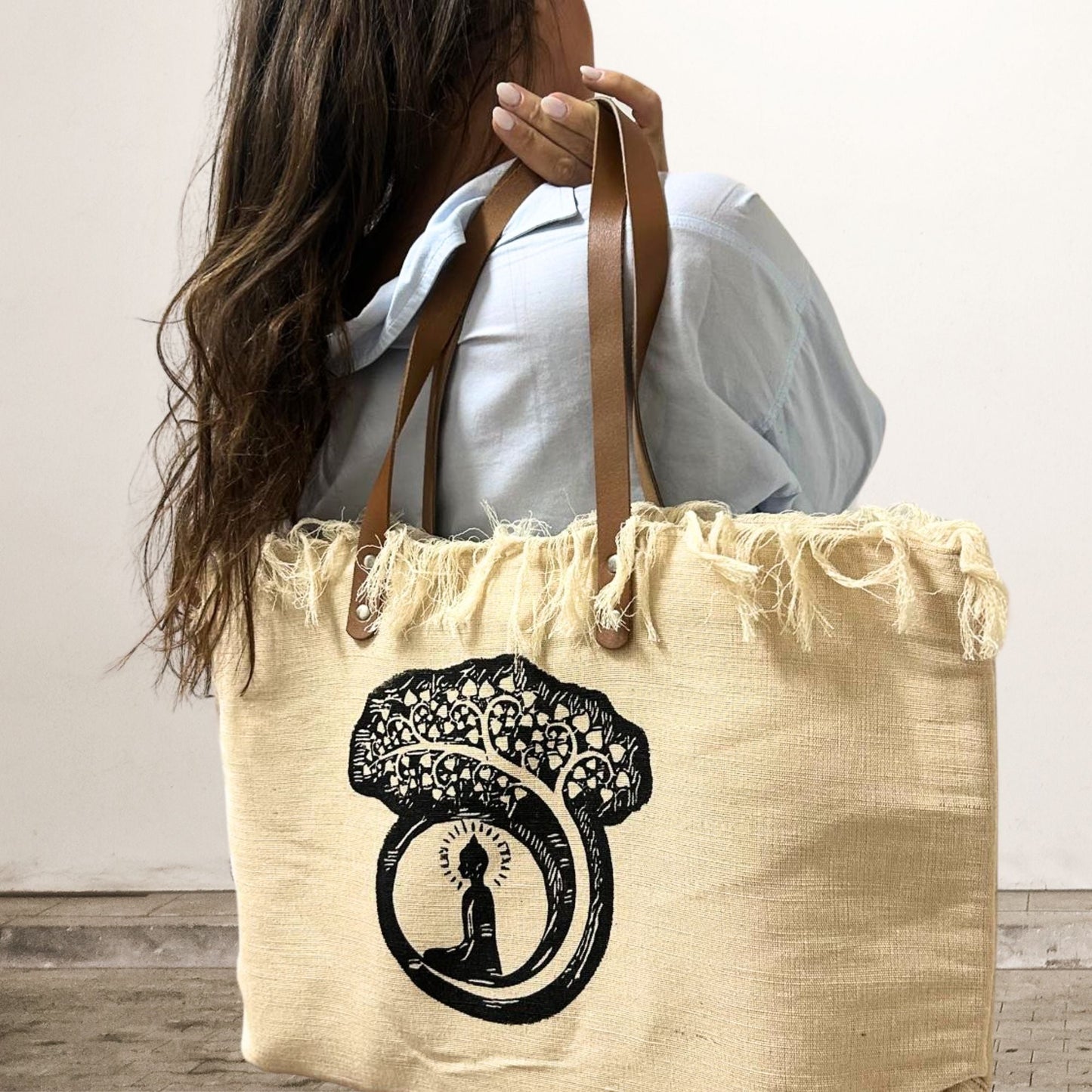 Alt Tag: Natural Cotton Tote Bag with Leather Handle – Buddha worn on shoulder, natural cotton tote with leather handles and Buddha print