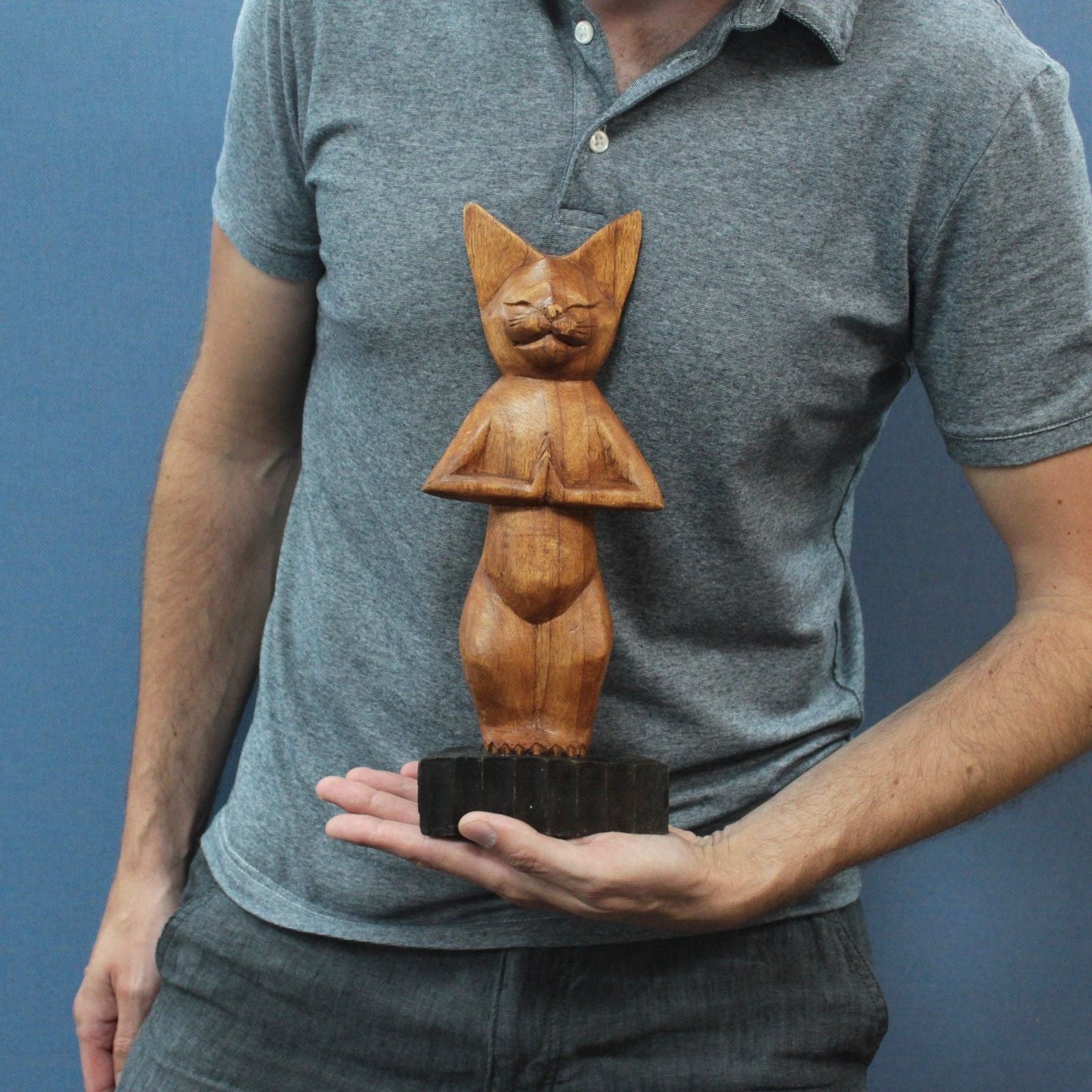 Alt Tag: Suar Wood Yoga Cat Sculpture – Standing 31CM handcarved suar wood yoga cat figurine standing on base, held in hands
