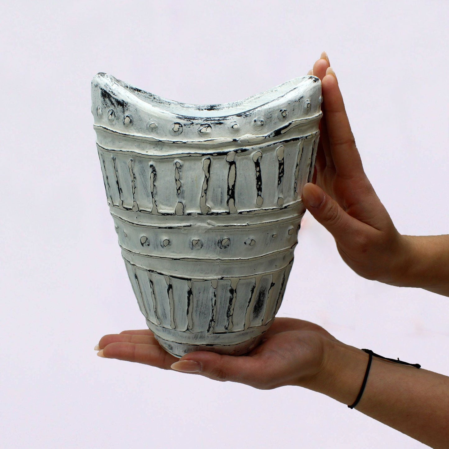 Terracotta Ceramic Vase – Cream 22CM held in hands, wide-neck cream terracotta ceramic vase with textured bands