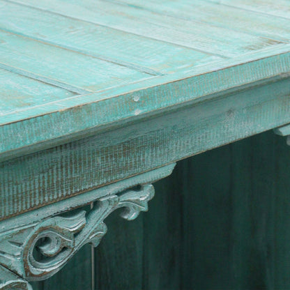 Albasia Bathroom Cabinet – Turquoise Wash detalle de esquina superior con acabado turquesa lavado y veta de madera visible