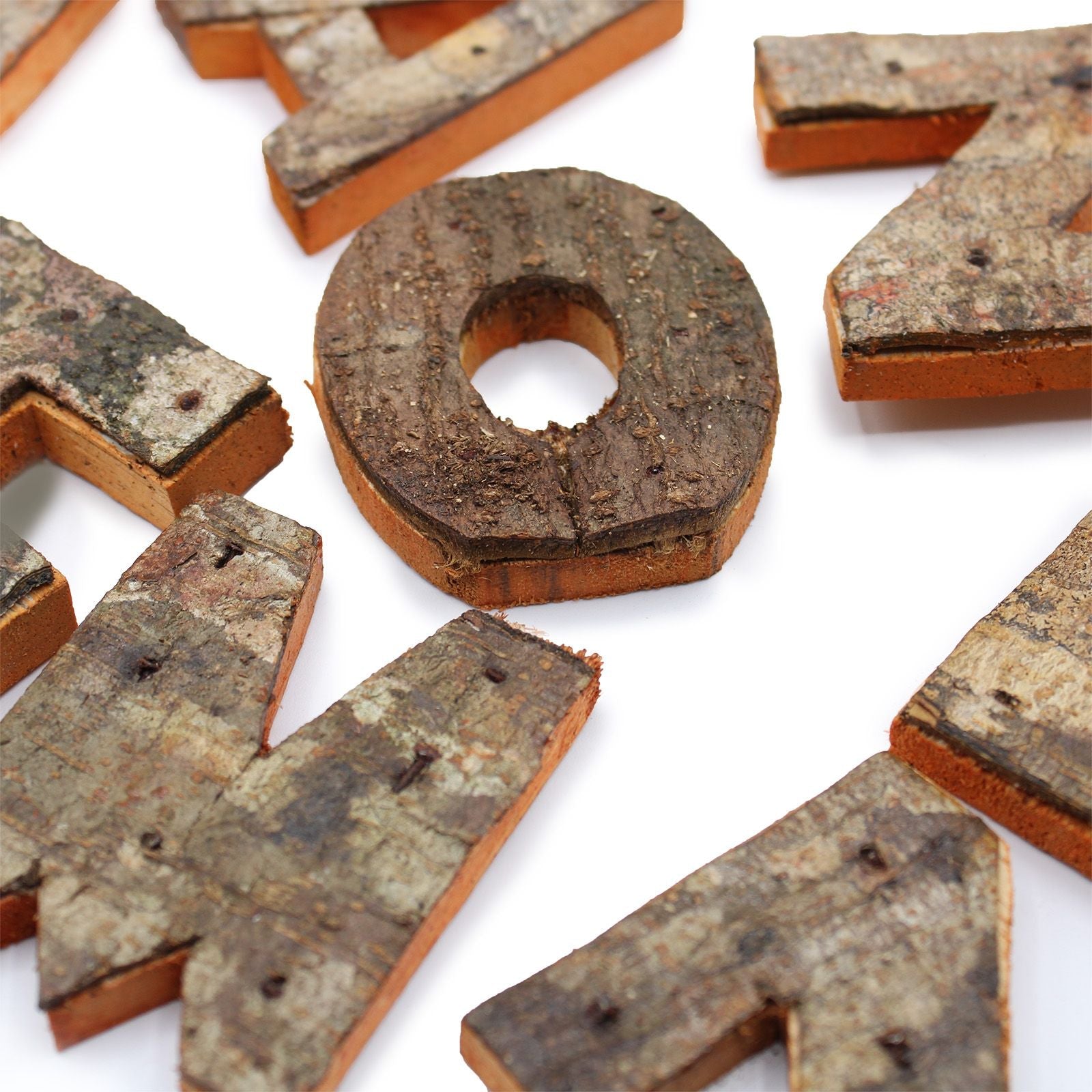 Albasia Wood Rustic Bark 'LOVE' Display – Set of 4, close-up of letter O with natural bark texture rustic wood decor
