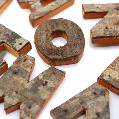 Albasia Wood Rustic Bark 'LOVE' Display – Set of 4, close-up of letter O with natural bark texture rustic wood decor