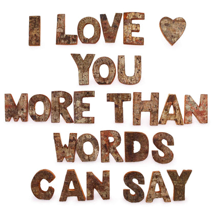 Albasia Wood Rustic Bark 'LOVE' Display – Set of 4, rustic bark wood letters forming “I LOVE YOU MORE THAN WORDS CAN SAY” wall decor