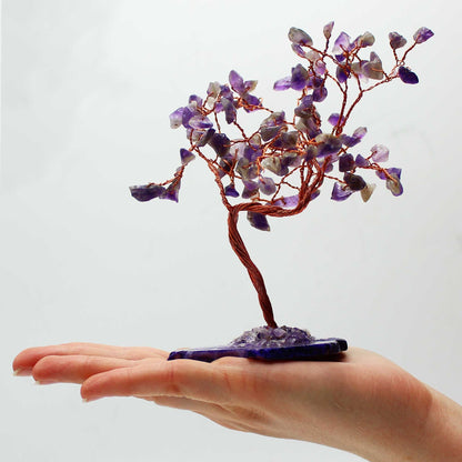 Alt Tag: Amethyst Gemstone Tree – Large 100-Stone Agate Base held in hand, wire branches with purple amethyst stones on natural agate base