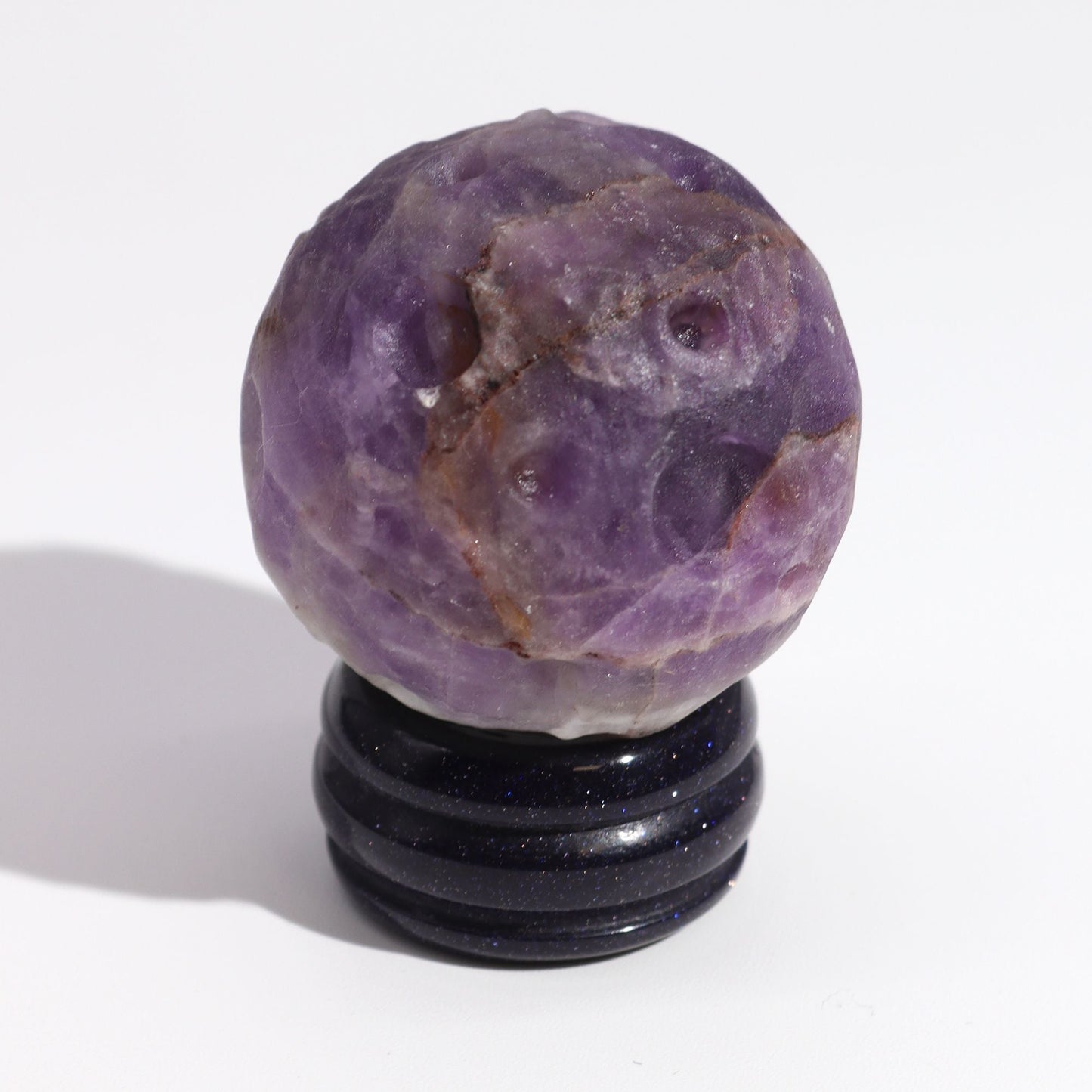 Alt Tag: Amethyst Jupiter Gemstone Planet – 40MM Solar Goldstone Stand, 40mm purple amethyst sphere on dark goldstone stand