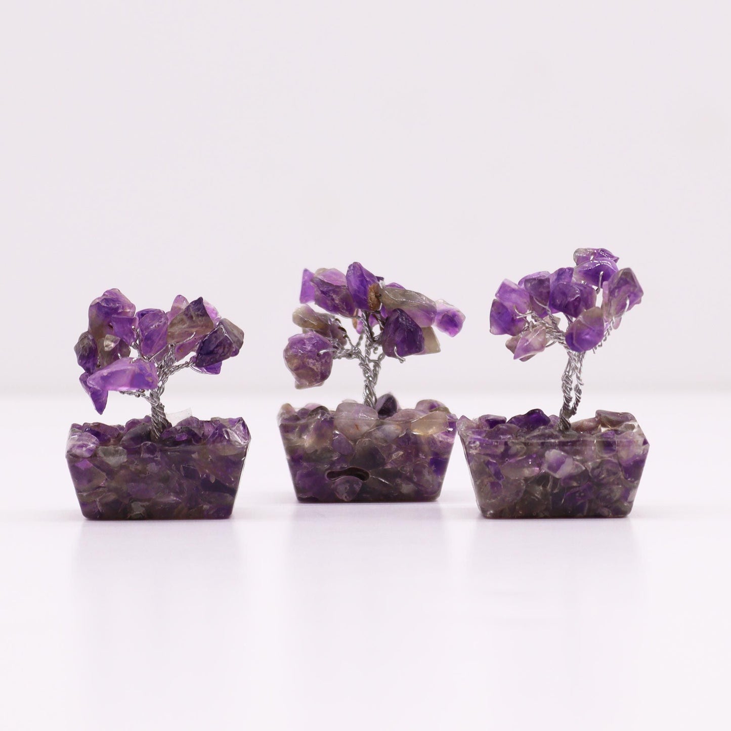Amethyst Mini Gemstone Tree – 15 Stones, three handcrafted mini purple amethyst chipstone trees on orgonite bases, 5 cm decor