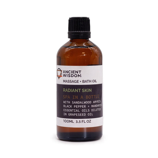 Alt Tag: Sandalwood Glow Massage Oil – 100ML 100 ml aromatisk massageolja på flaska med svart lock, för mjuk och återfuktad hud