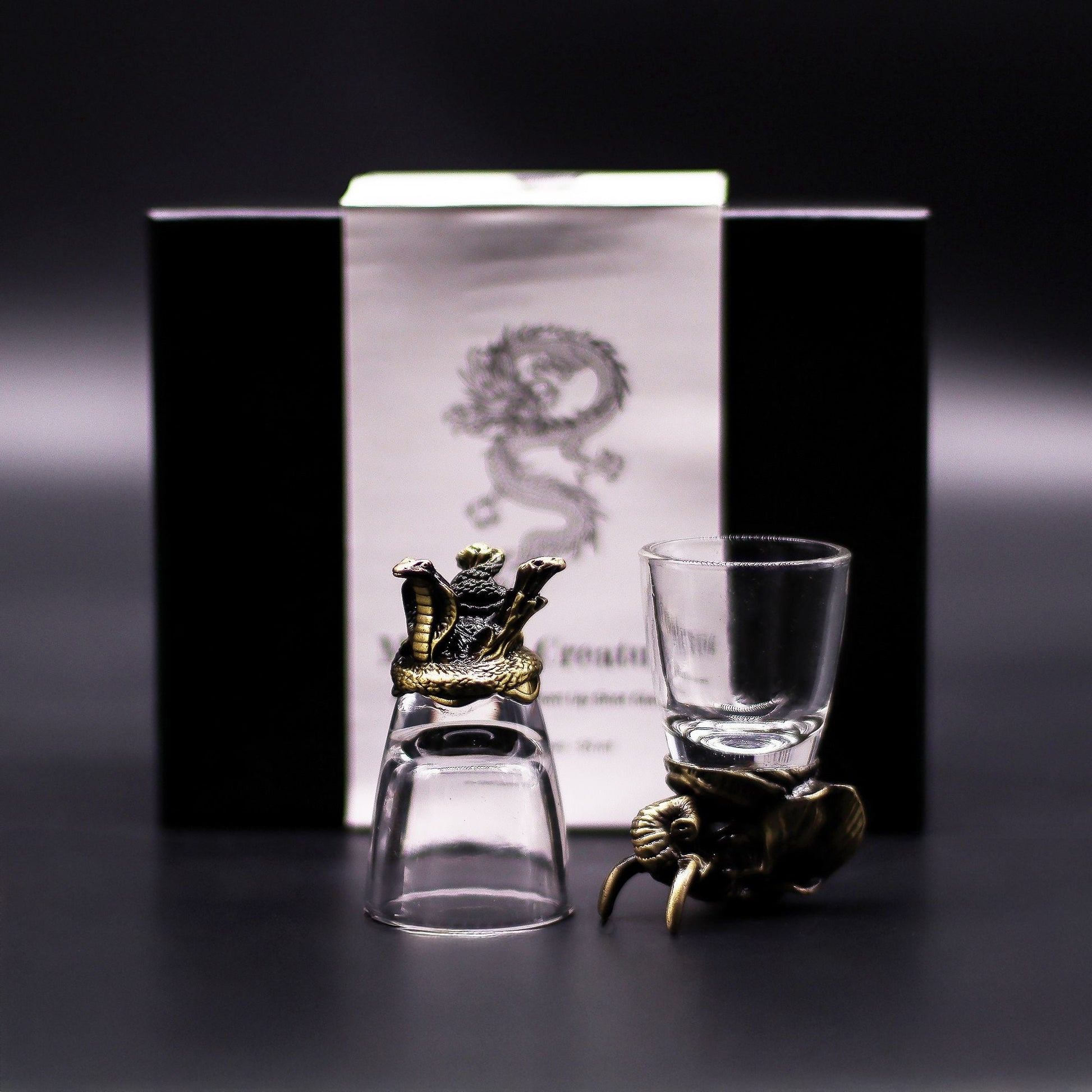 Antique Bronze Mystical Creatures Glasses – 50 ML set with dragon and octopus-themed bronze-style holders, clear shot glasses