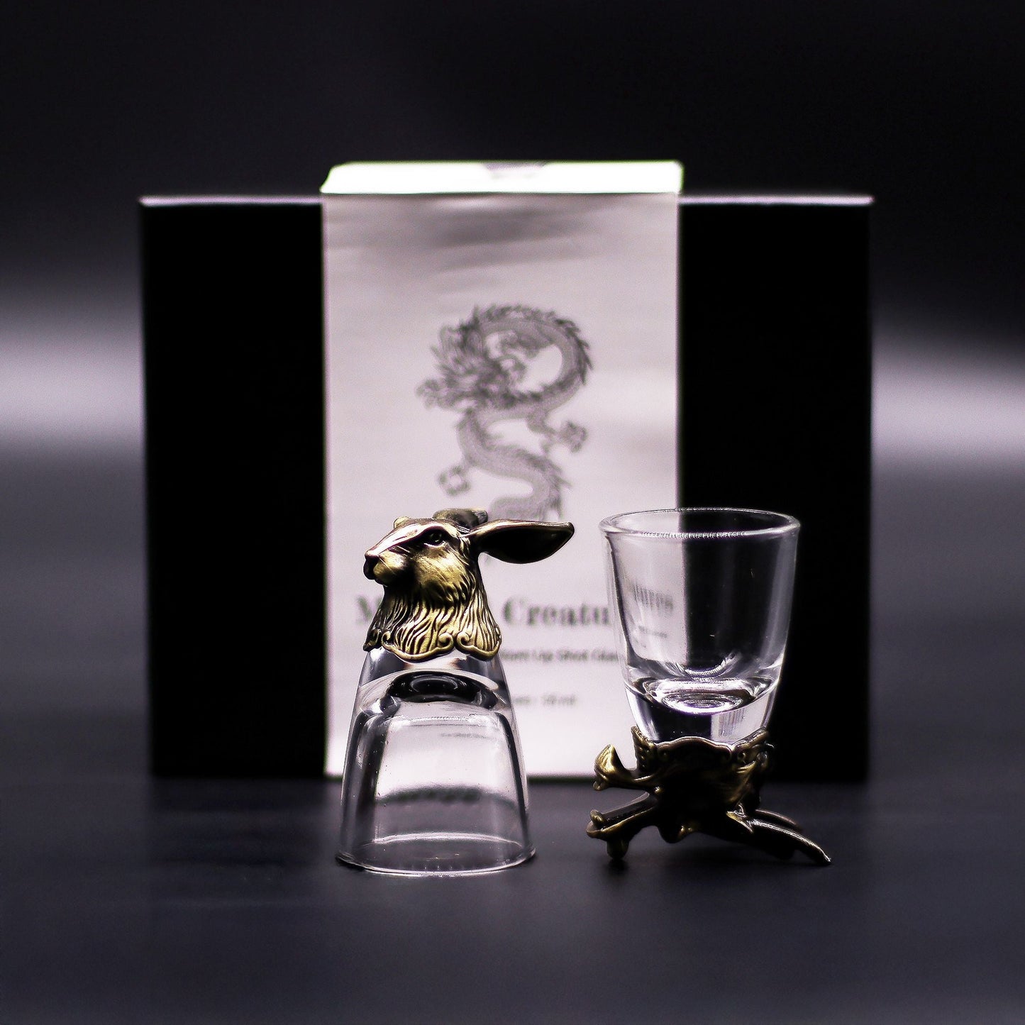 Antique Bronze Mystical Creatures Glasses – 50 ML set with bronze animal accents, clear shot glasses and product box