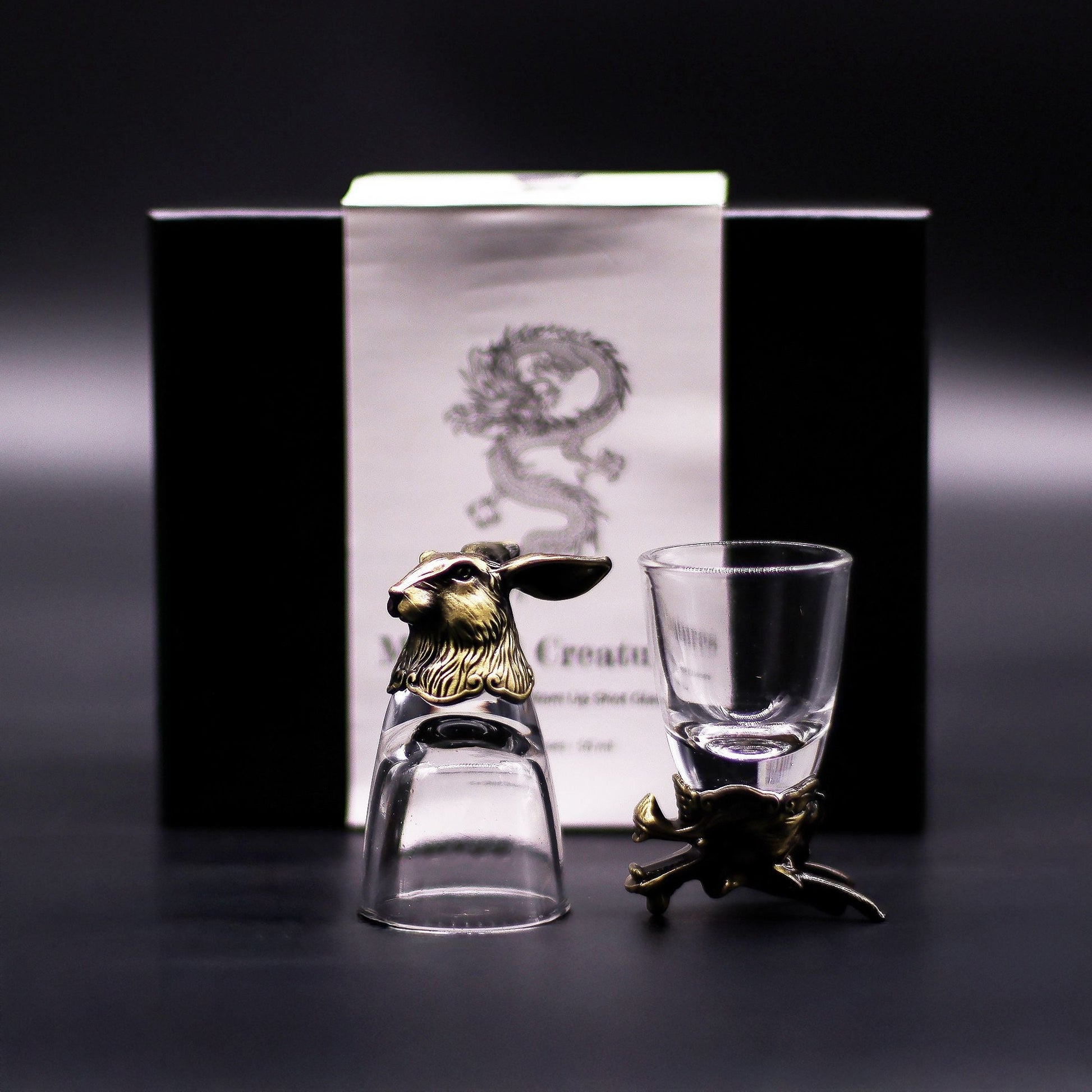 Antique Bronze Mystical Creatures Glasses – 50 ML set with bronze animal accents, clear shot glasses and product box
