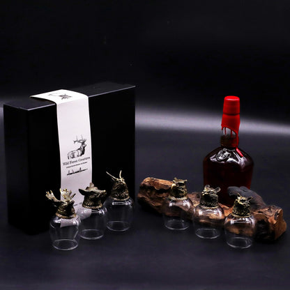 Antique Bronze Mystical Creatures Glasses – 50ML Set of 6 with animal head tops, gift box and bottle on dark background