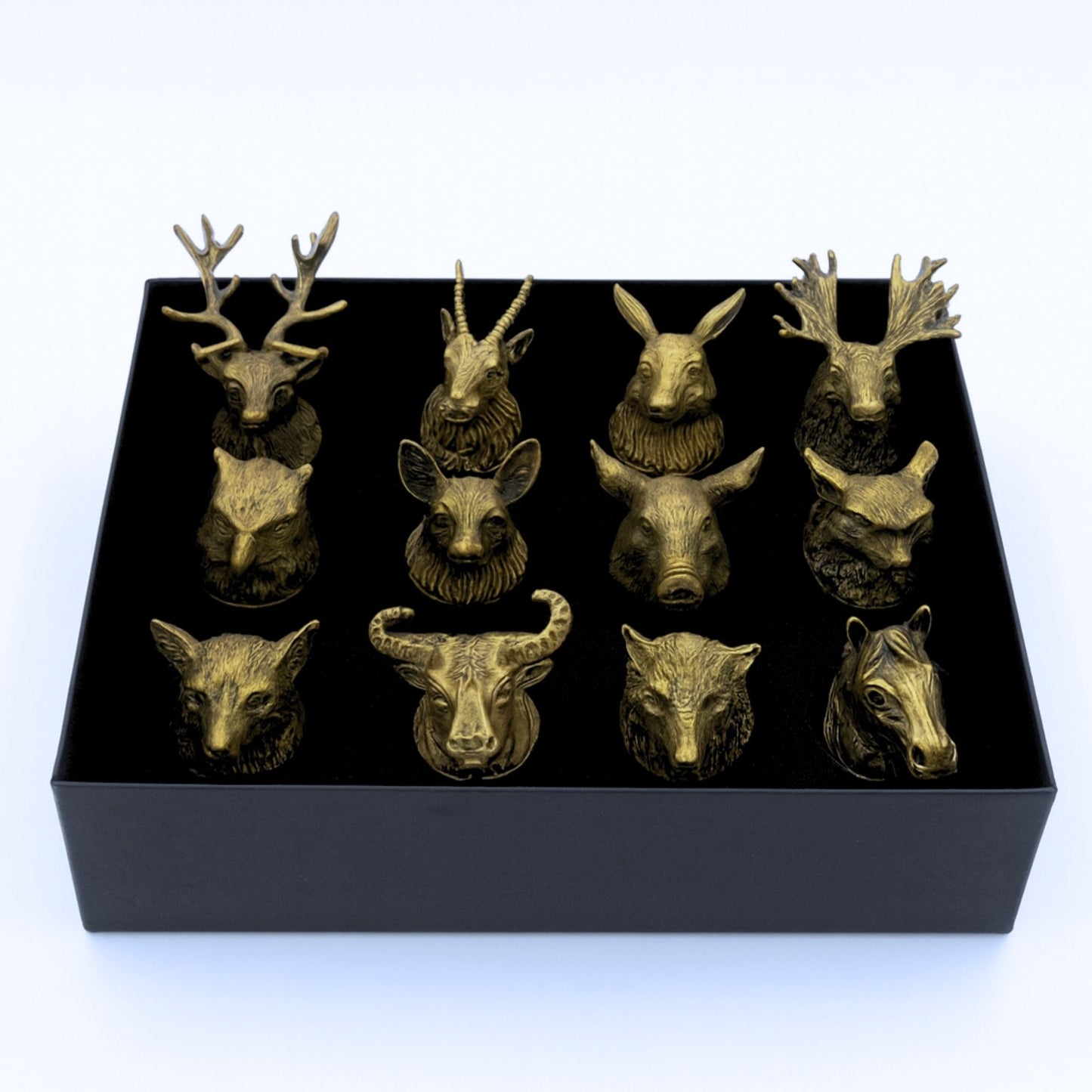 Alt Tag: Antique Bronze Shot Glasses – 25ML Set of 12 with forest animal head designs displayed in a black gift box