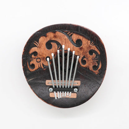 Antique Coconut Kalimba – 16x15 CM de coco artesanal, kalimba con 7 láminas metálicas y grabado decorativo, vista frontal