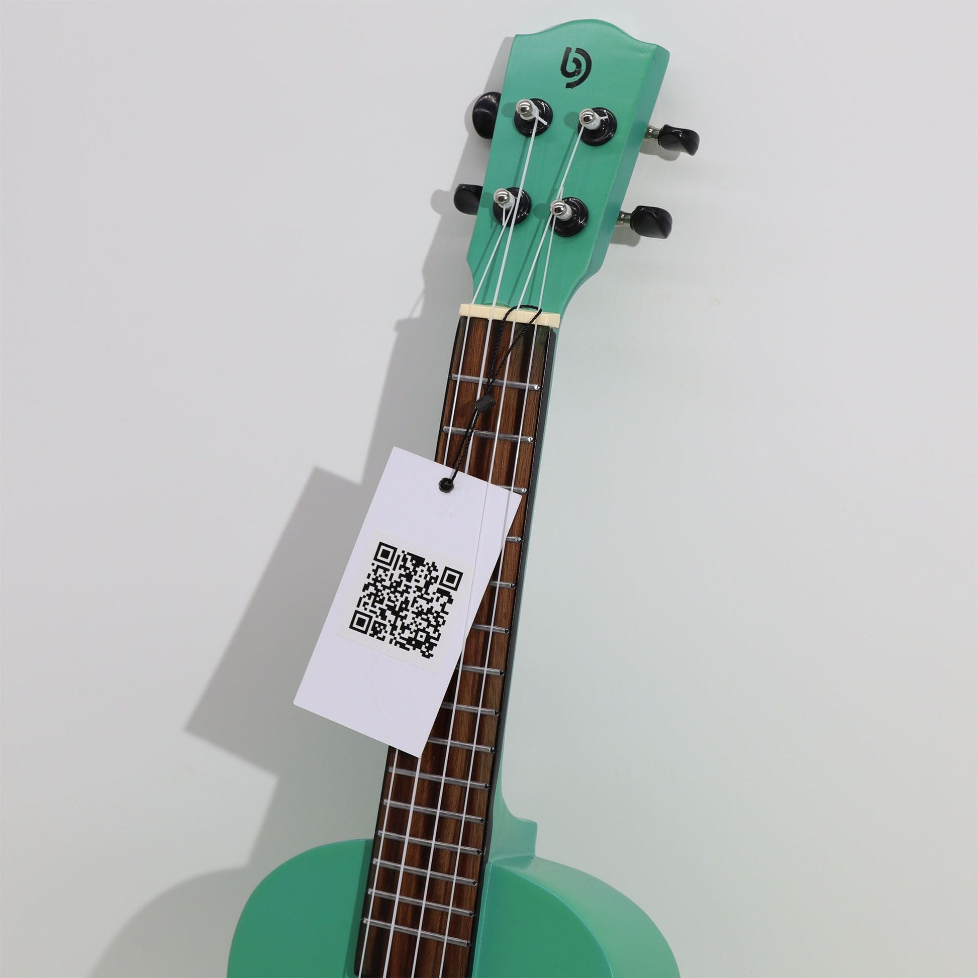 Alt Tag: Artisan Made Ukulele – Orange Sunburst Finish (4 String) headstock and tuning pegs close-up with QR tag