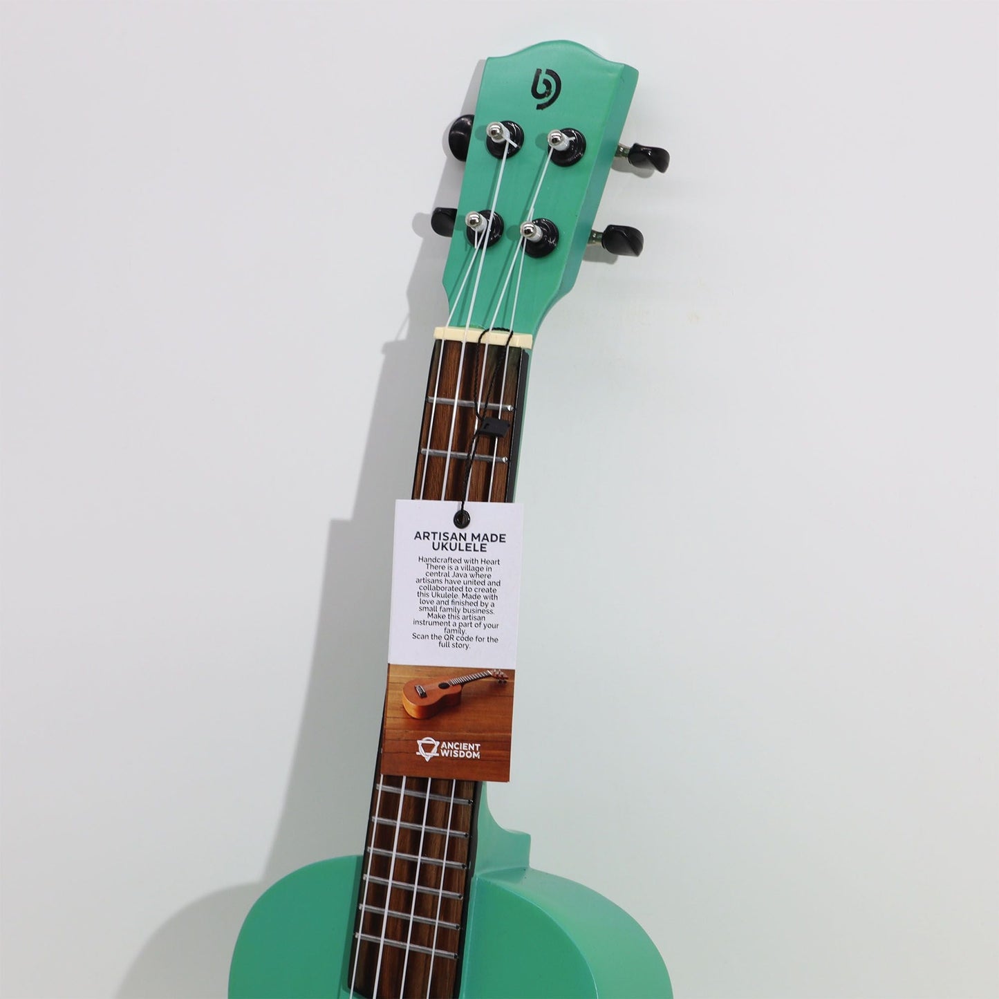 Alt Tag: Artisan Made Ukulele - Bright Pink Finish (4 String) 4-string ukulele neck and headstock with glossy finish and tuning pegs