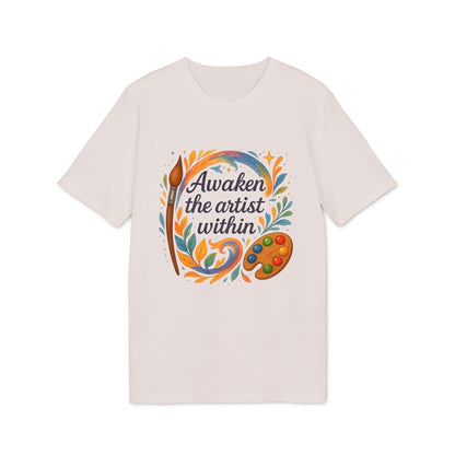 Alt Tag: Awaken The Artist Within Waldorf Sustainable Unisex Tee cream t-shirt with colorful paintbrush and palette graphic text