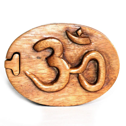 Handcrafted Saman wood magic puzzle box with Om detail, 6.5x2.5 cm, Bali style hidden compartment keepsake box