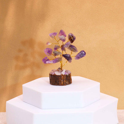 Handcrafted mini amethyst gemstone tree with 15 purple stones on wooden base, 6 cm crystal decor