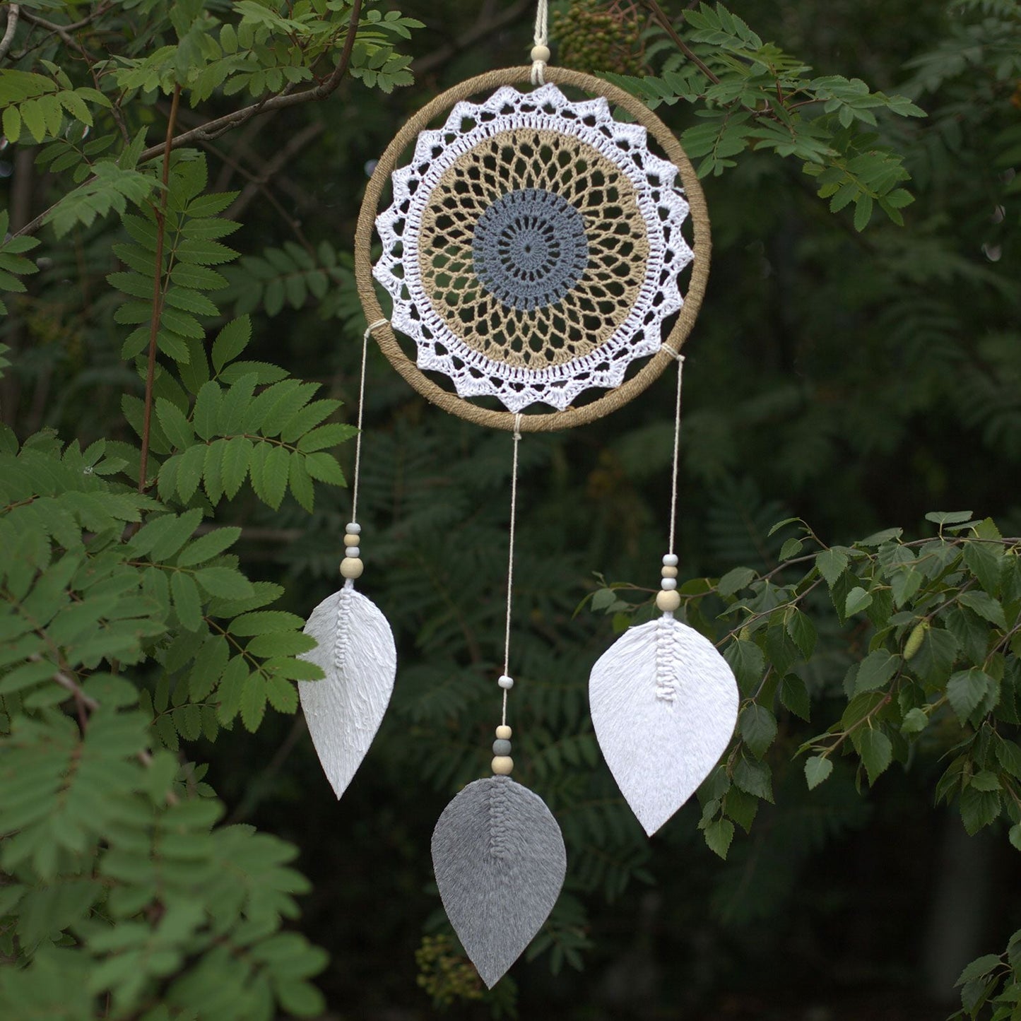 Large brown seagrass and cotton dream catcher wall hanging with woven hoop and wooden beads, 65x27 cm
