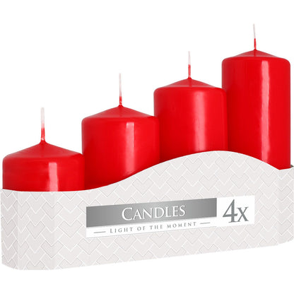 Set of four red paraffin wax pillar candles in graduated heights 7, 9, 11 and 13 cm for home decor