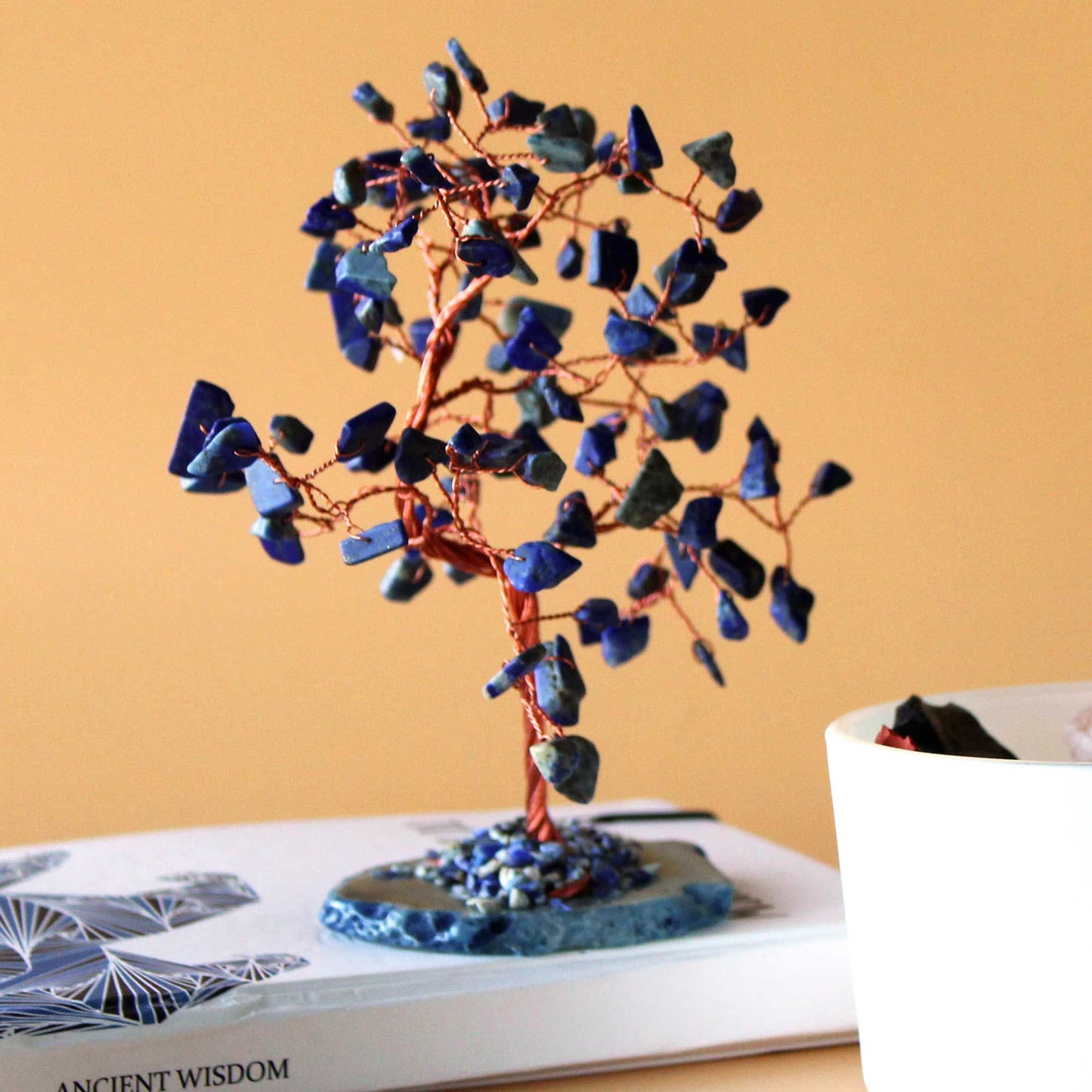 Large sodalite gemstone tree with 100 blue chipstones on adjustable wire branches, set on a blue agate base