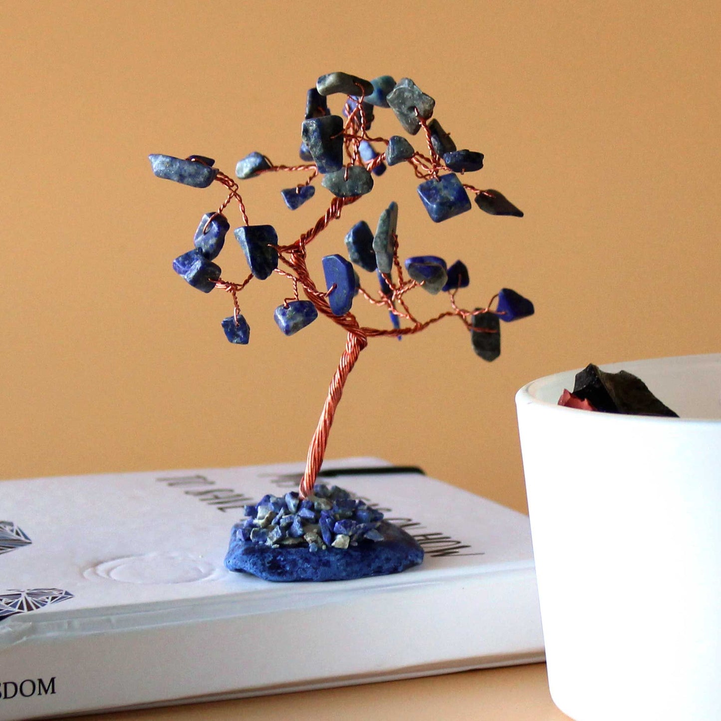 Sodalite gemstone tree with 35 blue chip stones on metal wire branches, mounted on polished blue agate base