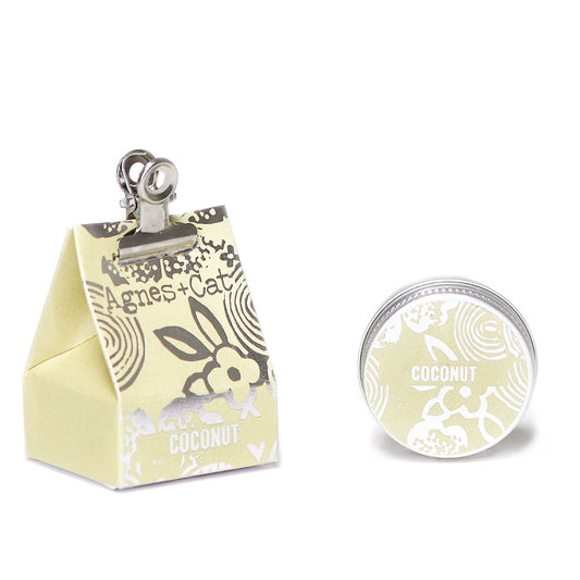 Coconut vegan lip balm in foiled packaging, made with shea, cocoa, jojoba, avocado and mango butters for soft lips.