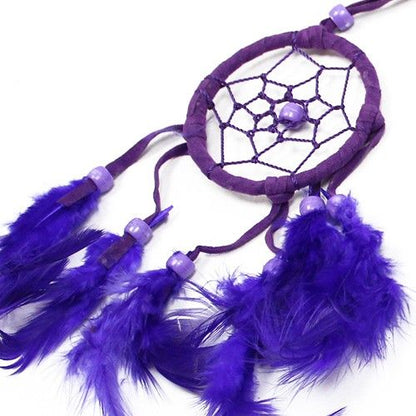 Small round dreamcatcher in turquoise, pink and purple with woven hoop and hanging strands wall decor