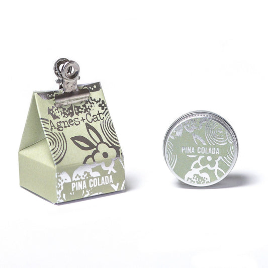 Vegan hydrating lip balm stick in Piña Colada scent, nourishing shea mango and avocado butters, cruelty-free lip care