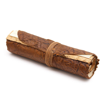 Handcrafted natural rolled leather travel notebook with wrap closure, 96 unlined pages, 21 x 15 cm