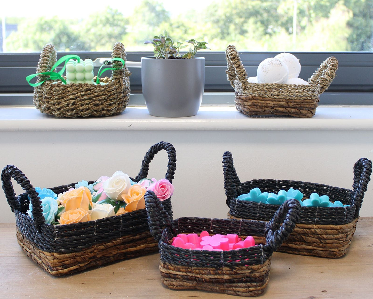 Banana Leaf & Seagrass Basket Set – 3 Sizes handwoven storage baskets with handles, used for organizing bath items and decor