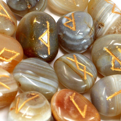 Alt Tag: Banded Agate Rune Stone Set – 11x9 CM with engraved gold rune symbols on polished banded agate stones