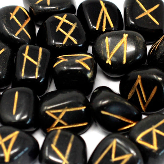 Black Agate Rune Stone Set – 25-Piece Pouch, black polished rune stones with gold engraved symbols close-up