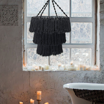 Alt Tag: Black Cotton Macrame Chandelier – 80x50 CM black cotton macrame chandelier hanging in window above candles