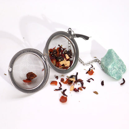 Black Obsidian Crystal Tea Strainer – 7.5x5 CM with stainless steel mesh infuser, loose leaf tea blend, and green crystal stone
