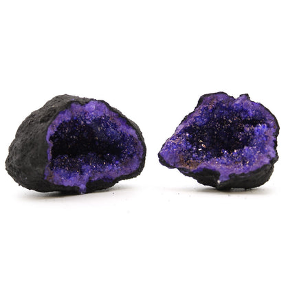 Black Rock Calcite Geode – Turquoise – 8.5x6 CM, dark rock geode halves with sparkling crystal interior on white background