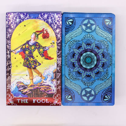 Alt Tag: Blue Foil Tarot Card Set – Mandala (with Booklet) showing The Fool card and blue mandala foil-style card back design