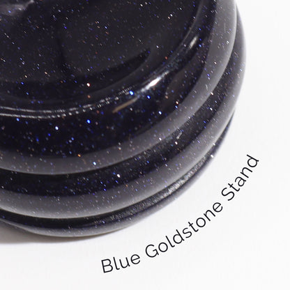 Alt Tag: Rose Quartz Gemstone Planet – 40MM with Goldstone Stand, close-up of blue goldstone stand base with sparkling finish