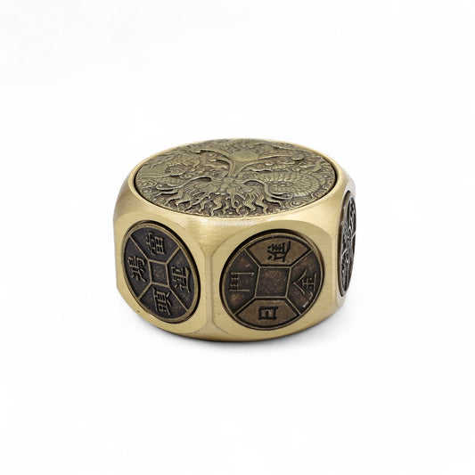 Brass Ancient Fortune Spinner – 5x3.2 CM solid brass dragon-engraved spinner with rounded edges, hexagonal design, close-up