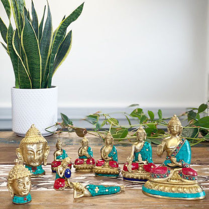 Brass Buddha Figure – Large Head 11.5 CM brass Buddha statues with turquoise and red accents displayed on wooden table