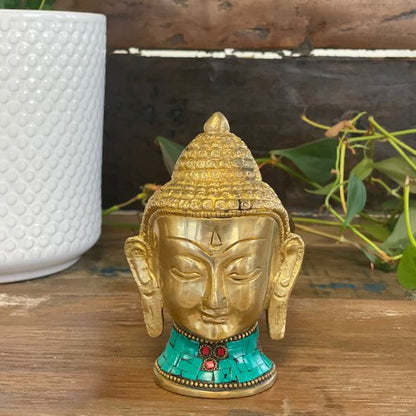 Alt Tag: Brass Buddha Figure – Large Head 11.5 CM brass Buddha head statue with turquoise howlite stone inlay on wooden surface