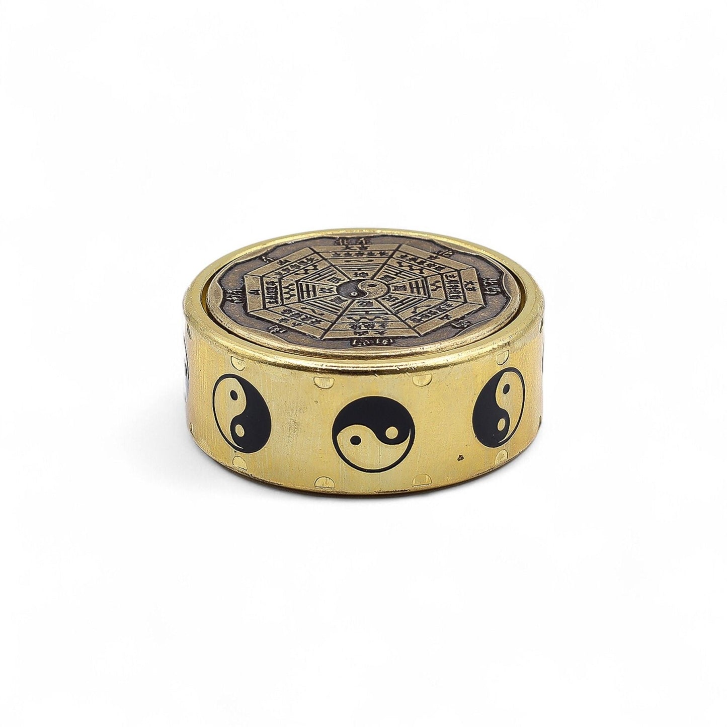 Alt Tag: Brass Feng Shui Energy Disc – 2x4.5 CM brass disc with yin yang symbols and feng shui bagua design, compact fortune spinner