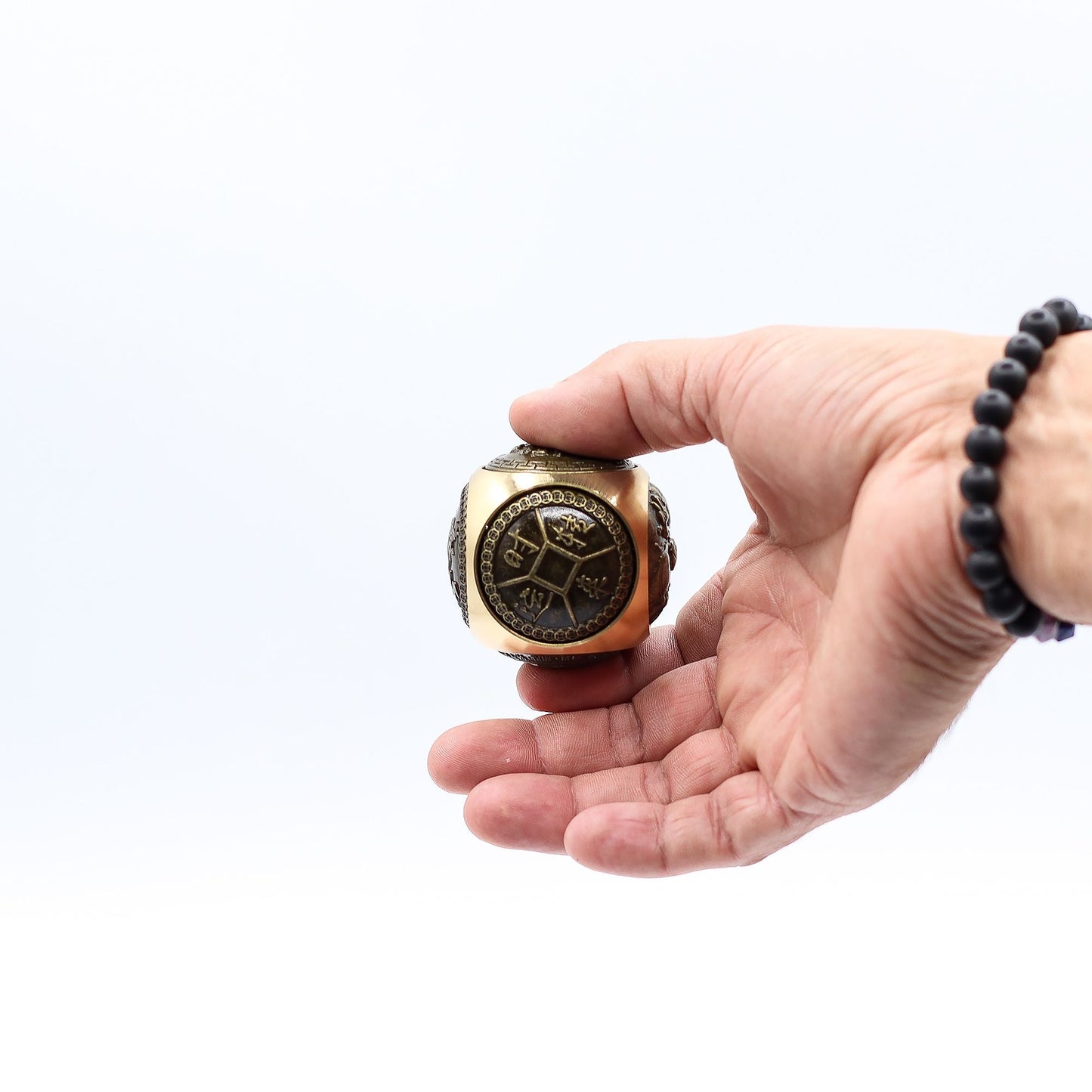Brass Feng Shui Wealth Spinner – 5.5 CM held in hand, brass fortune spinner with Chinese-style engraved design