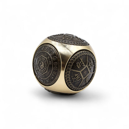 Alt Tag: Brass Feng Shui Wealth Spinner – 5.5 CM brass fortune spinner ball with engraved Chinese designs, close-up on white background